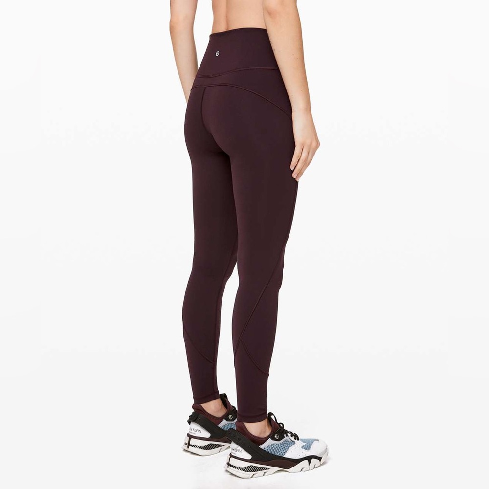 Lululemon In Movement Tight *Everlux
in Plum Shadow. 
Size 4. Pristine Condition